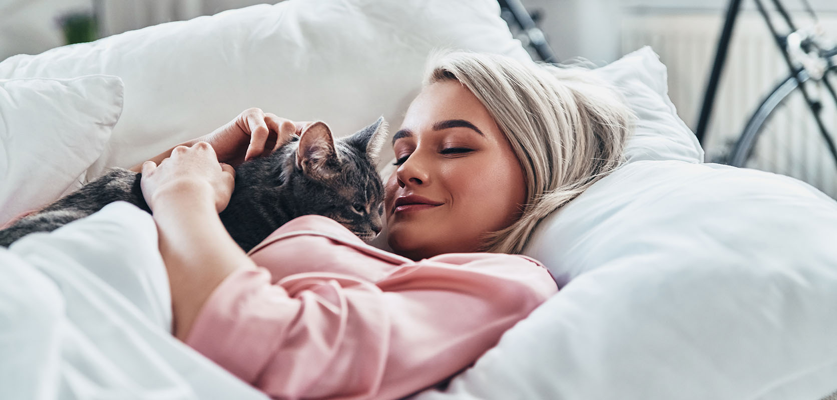 Girl cuddling with her cat. buy weed online. buy vapes online canada. top weed site. 