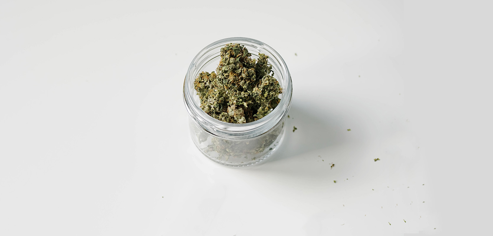 Weed buds stored in a glass jar. buy weeds online. mail order weed canada. weed online.