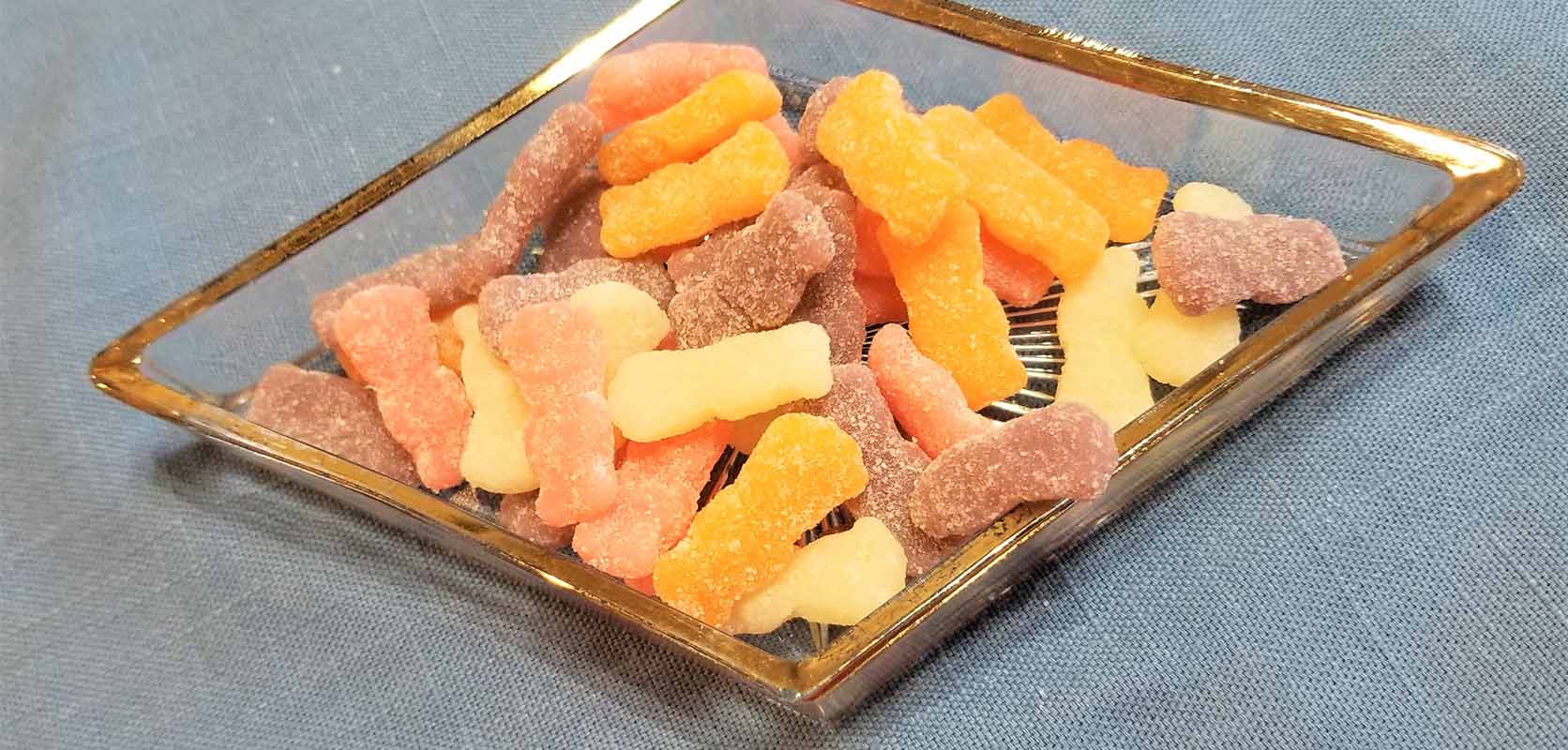 Best Edible Gummies to buy online in Canada showcased on a glass plate. 