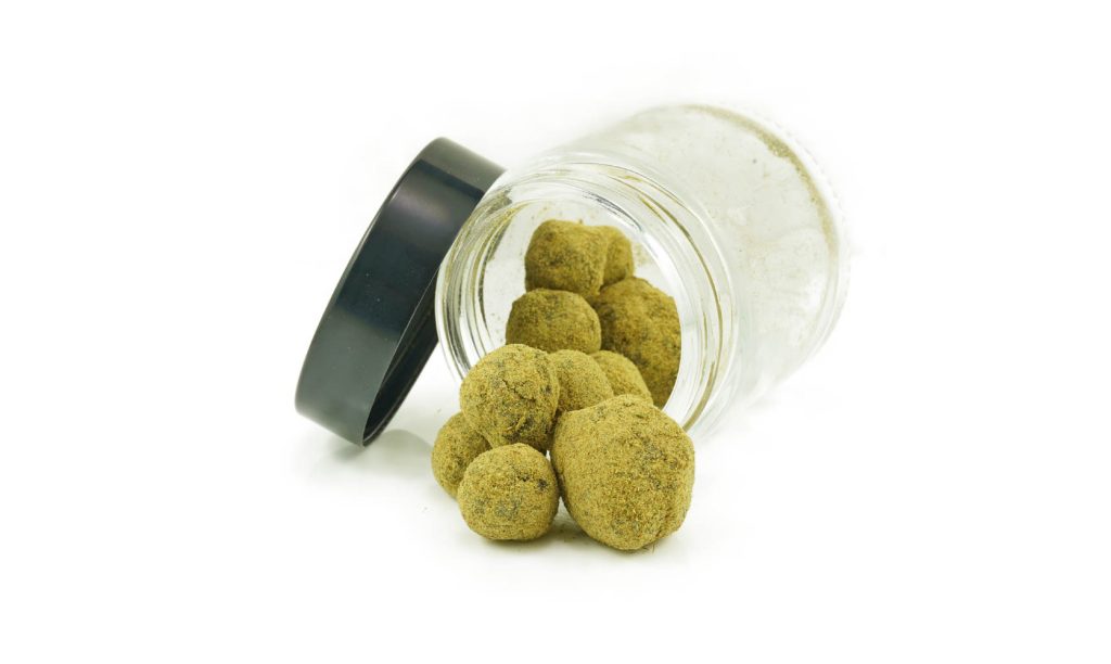 Moon rock weed budget buds in a glass jar. Buy weed online. dispensary for cheapweed.