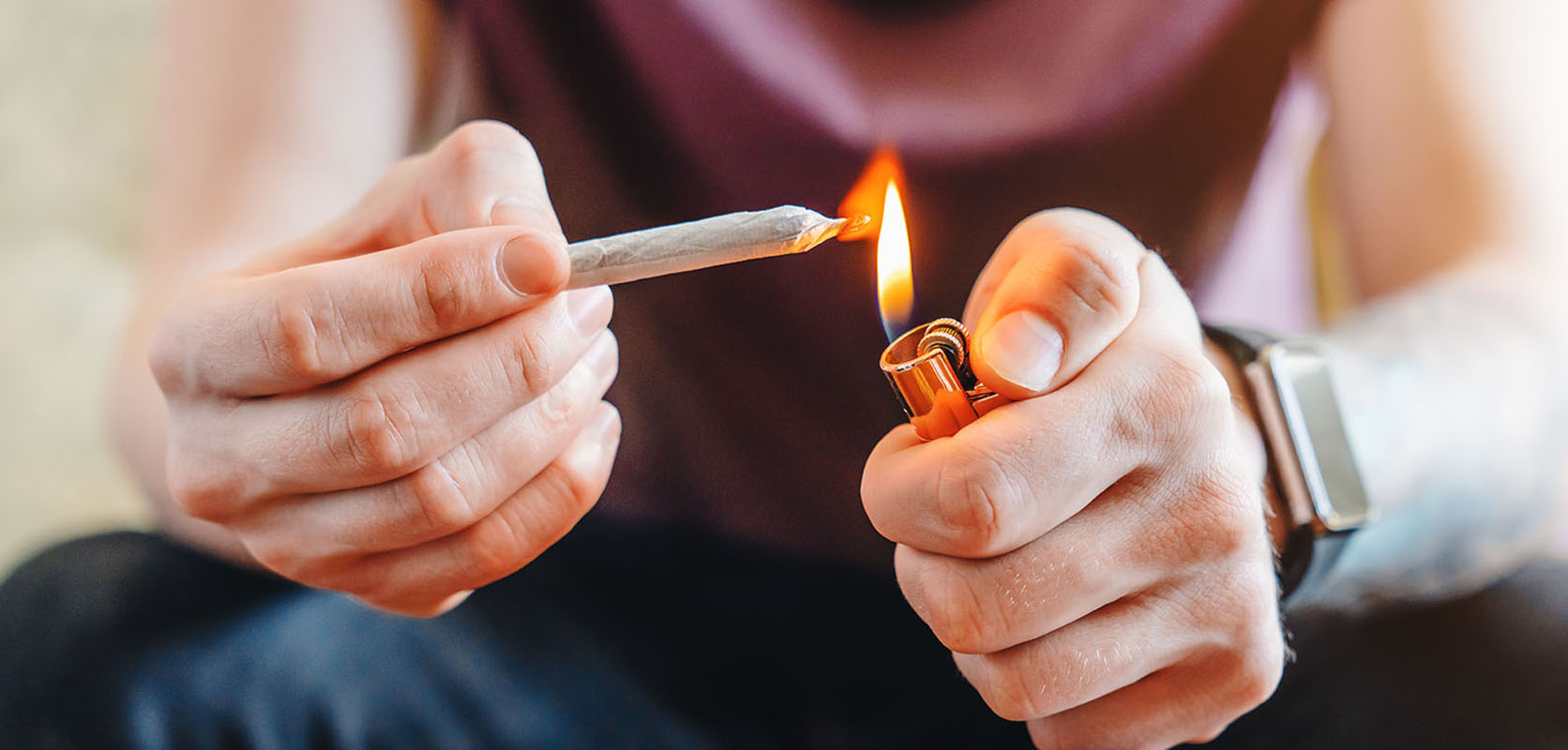 Lighting a joint. dispensary for edibles and dab pen. weed shop. weeds online. Dispencary.