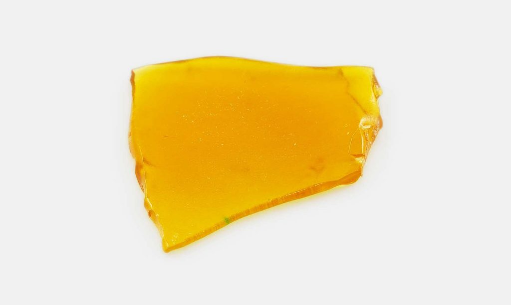 slab of shatter weed cannabis concentrate dab drug. Buy shatter online at Low Price Bud weed dispensary for BC Bud online.